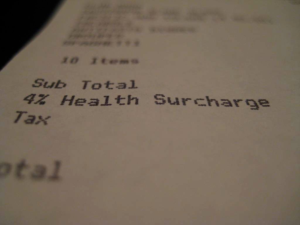 health surcharge written on paper